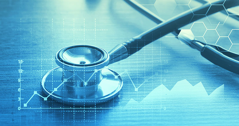 A stethoscope on a wooden surface with abstract data graphs and hexagonal patterns overlayed, symbolizing healthcare analytics, technology, and medical data analysis.