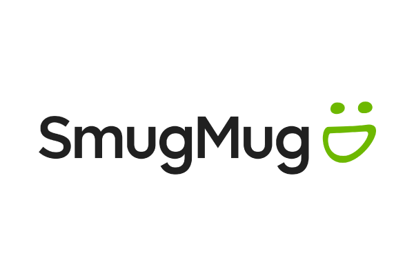 The SmugMug logo featuring the brand name in black text with a green smiley face design on a white background.