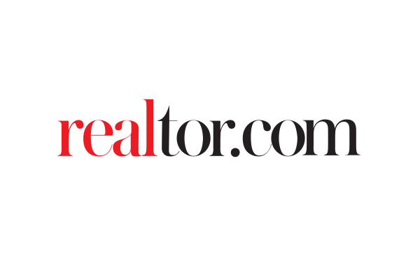 The logo of Realtor.com featuring the brand name in stylized text with 'real' in red and 'tor.com' in black.