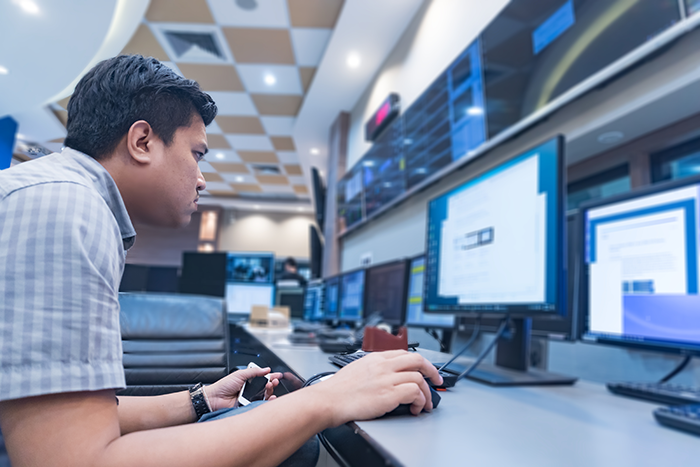 Engineer working at control room,Install program for control,Repair system,Thailand people,Check problem security of  system