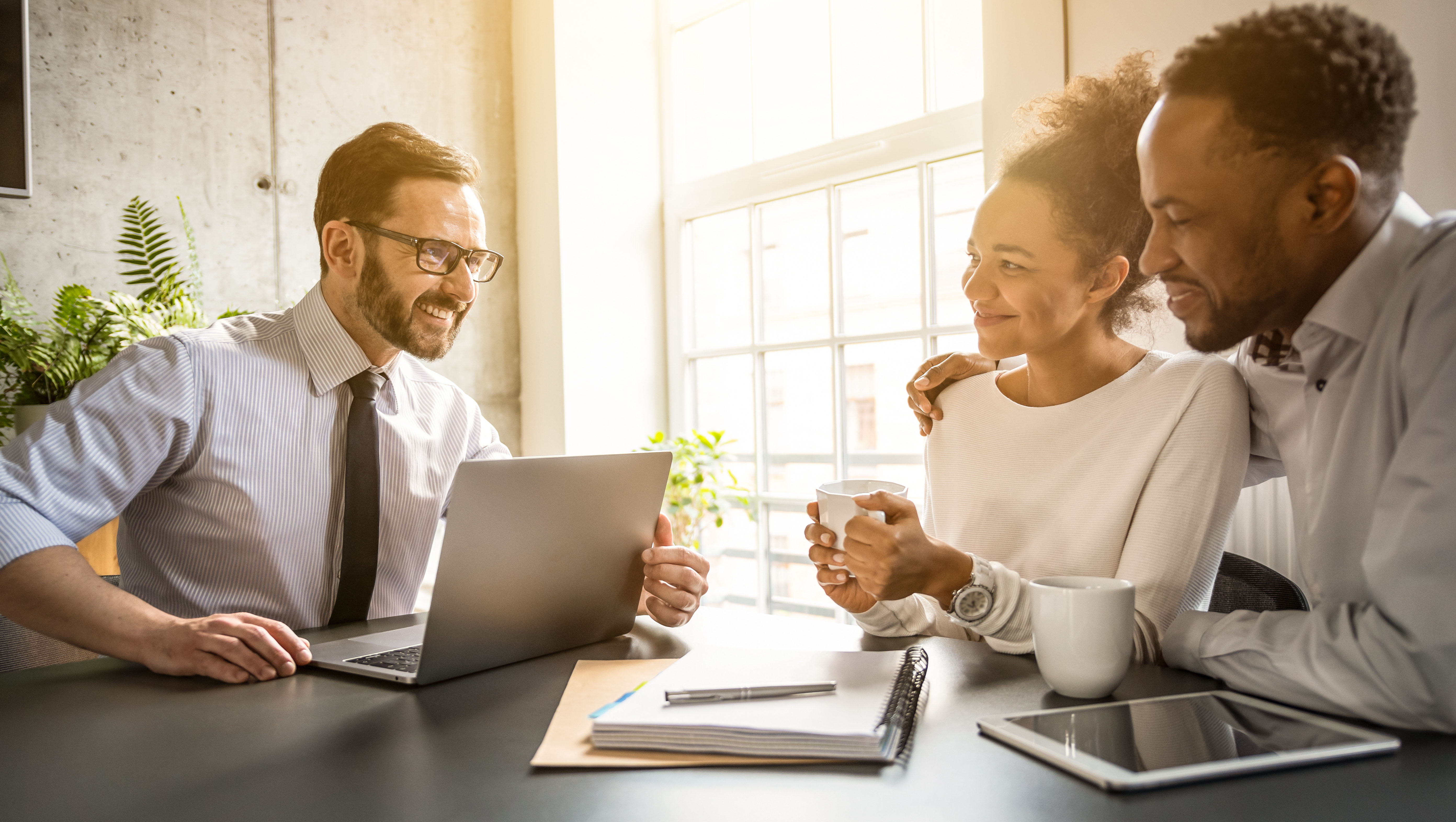 Family couple consultations with a lawyer or insurance agent. Law and insurance.