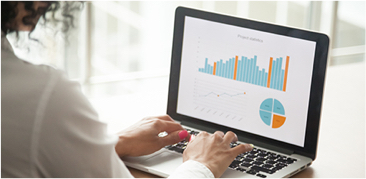 Person analyzing bar charts, line graphs, and a pie chart on a laptop screen.
