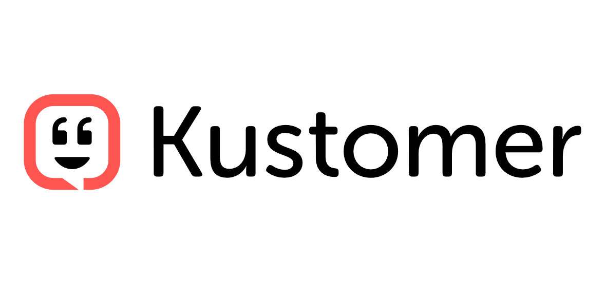 Alt-text: "Logo of Happy Scribe featuring a smiling face inside a red speech bubble next to the text 'Happy Scribe'."