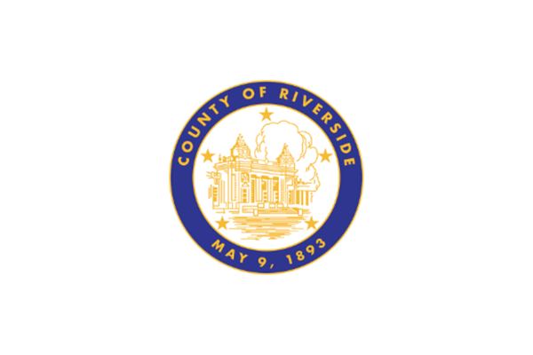 Seal of the County of Riverside featuring a classical building inside a blue and gold circle, with stars and the text 'County of Riverside May 9, 1893'.