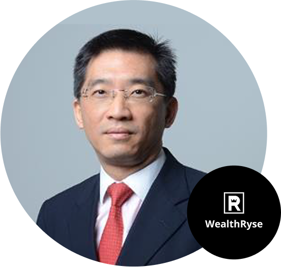 Portrait of a businessman in a suit and red tie with glasses, featuring the WealthRyse logo in the bottom right corner.