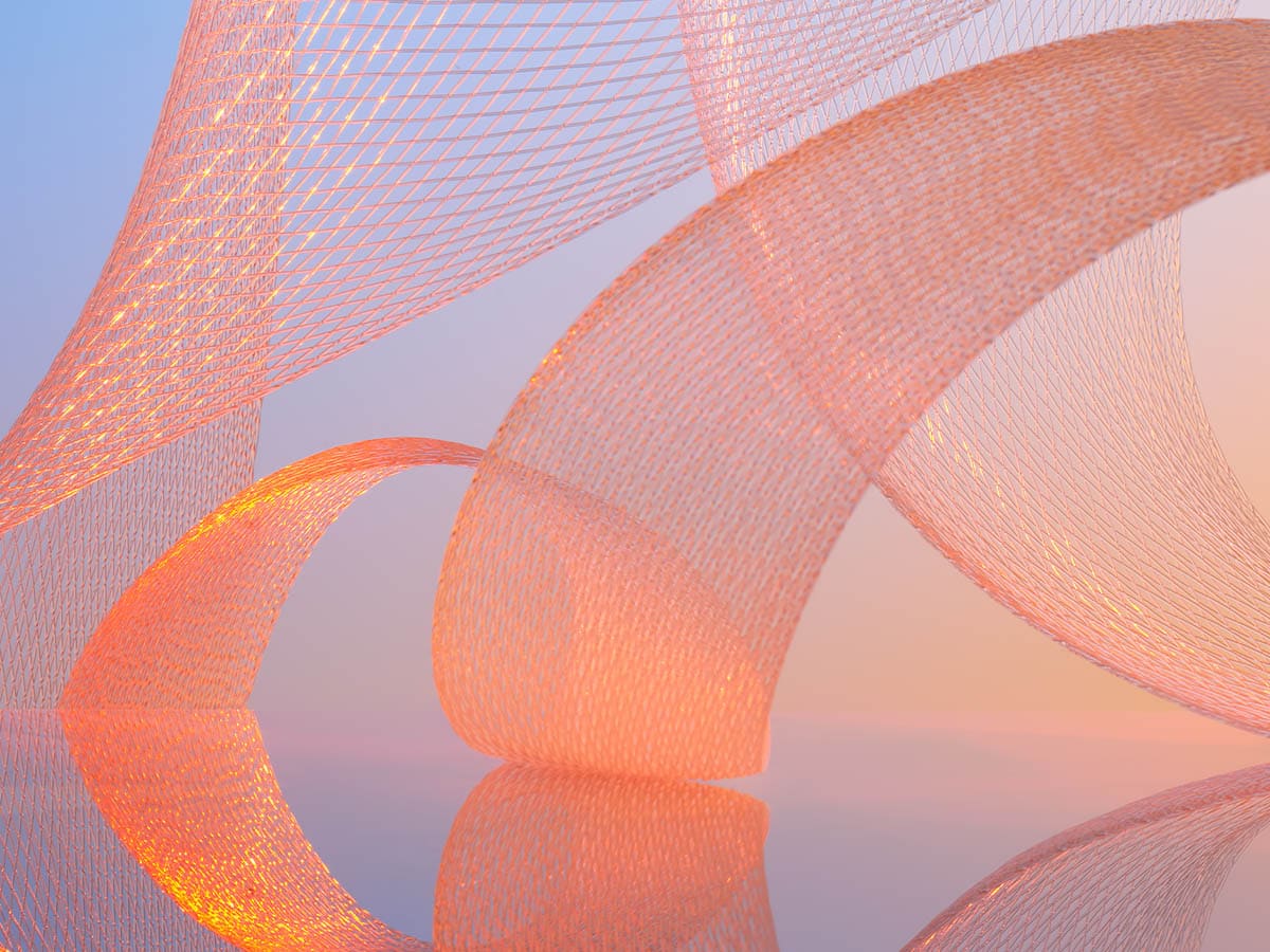 An abstract digital artwork featuring intricate mesh and curved ribbon-like structures, illuminated by warm light and reflected on a glossy surface against a soft blue and orange gradient background.
