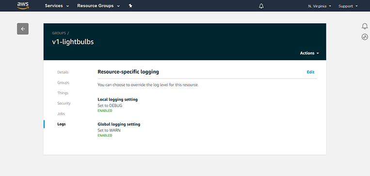 Screenshot of the AWS IoT Device Management console showing logging settings for a resource group named 'v1-lightbulbs,' including both local and global logging settings.