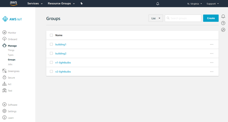 Screenshot of the AWS IoT Device Management console displaying the 'Groups' tab, showing example groups for buildings and lightbulbs. The UI includes navigation for managing, monitoring, and onboarding IoT devices.