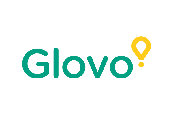 The image displays the Glovo company logo, featuring the word 'Glovo' in green letters with a yellow lightbulb symbol as the letter 'o'.