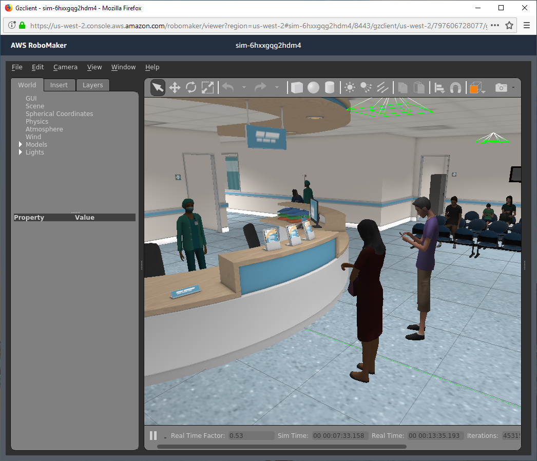 Screenshot of the AWS RoboMaker simulation interface displaying a virtual hospital environment, including a reception desk, staff, and visitors, used for simulating robotics in healthcare scenarios.