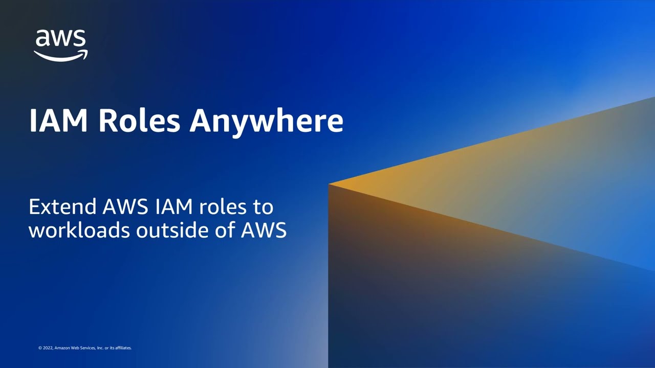 YouTube thumbnail that reads 'IAM Roles Anywhere: Extend AWS IAM roles to workloads outside of AWS'. The image features the AWS logo, text on a blue gradient background, and a geometric shape representing cloud technology.