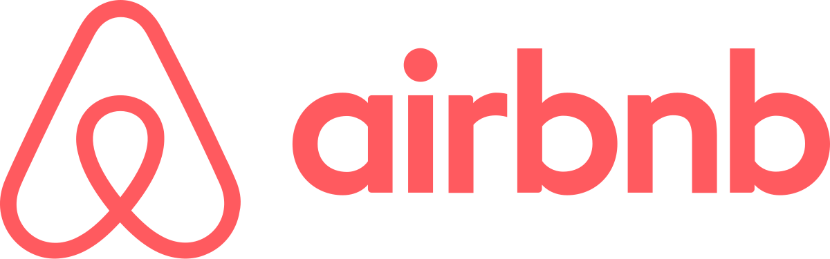 Airbnb logo featuring a coral-colored symbol and the word "airbnb" in lowercase coral text.