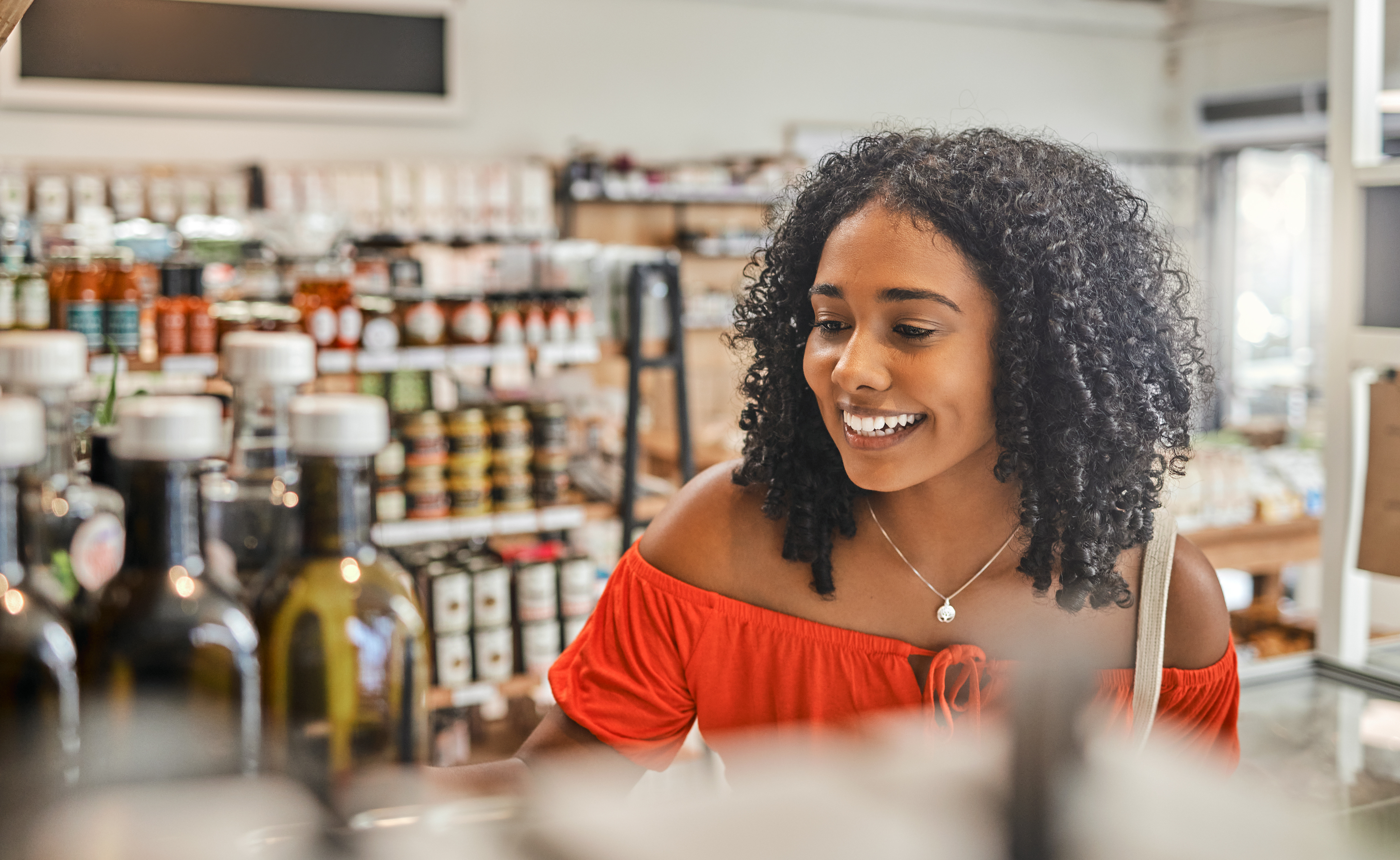 Supermarket, shopping local and sustainability, woman buying luxury food product in support of eco friendly small business. Grocery store with low carbon footprint for healthy sustainable lifestyle