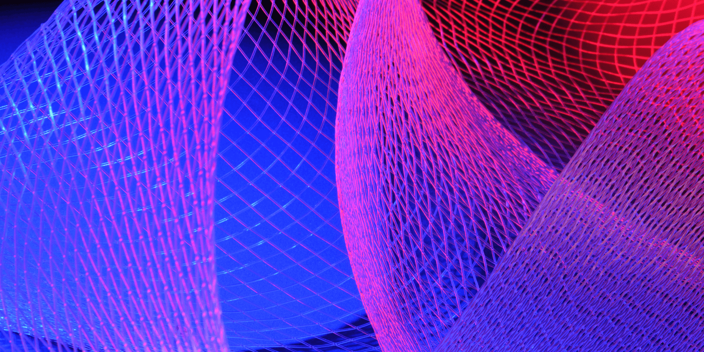 Abstract mesh patterns in vibrant blue and pink lighting.