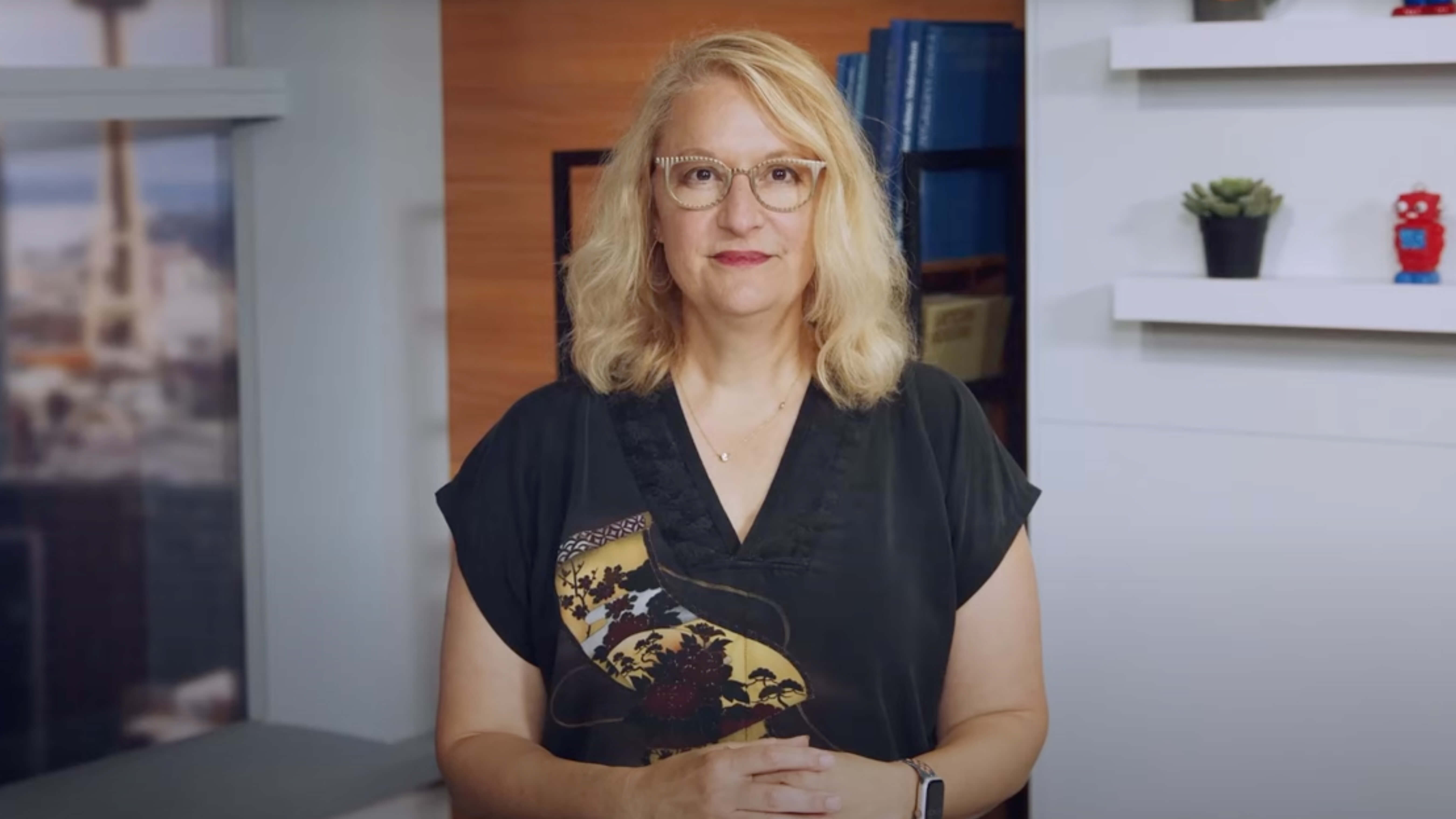 claire gribbin talking to camera about automating with ai and ml