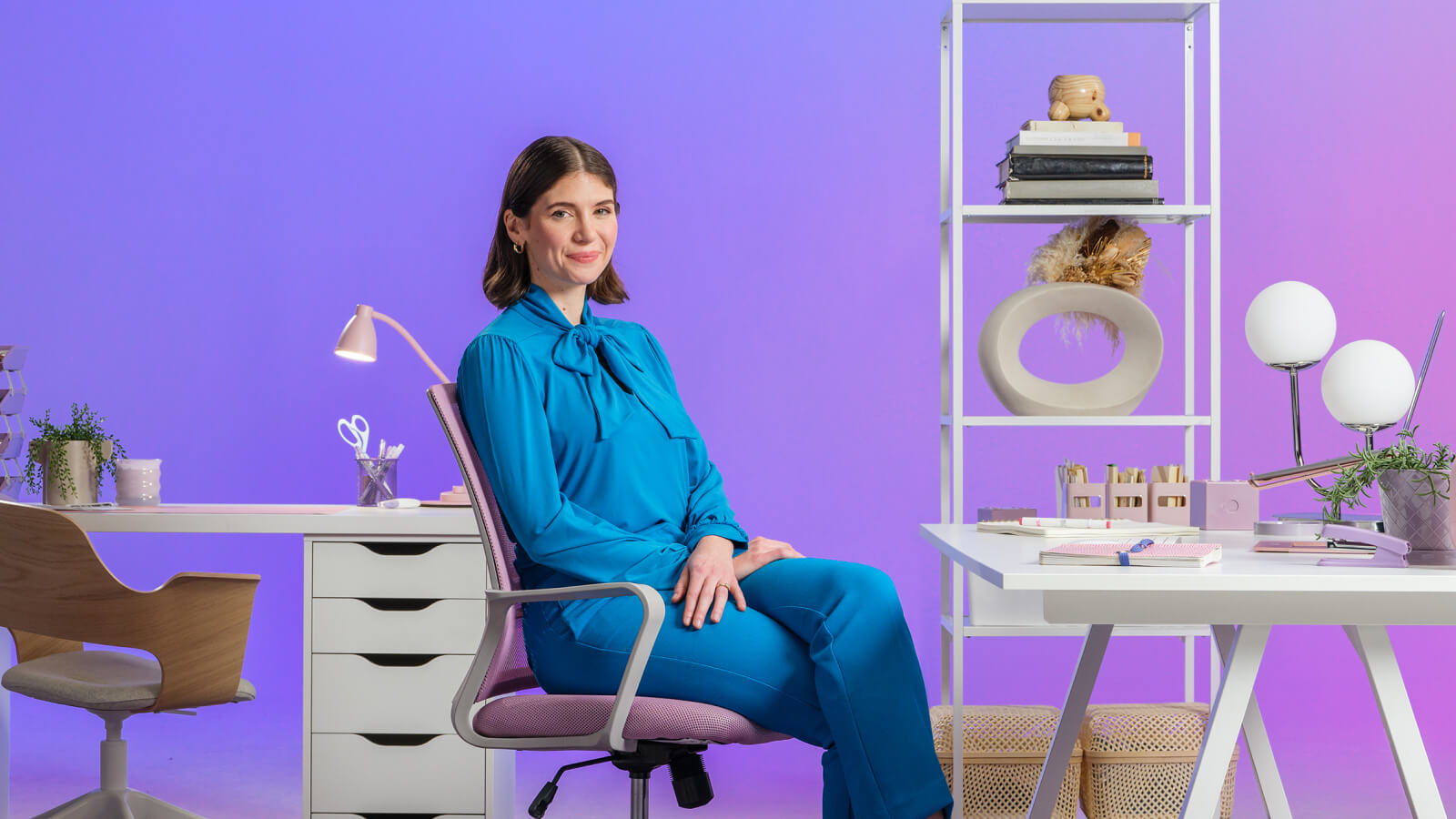 Woman sitting at desk with laptop