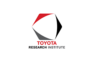 Logo of the Toyota Research Institute featuring a geometric design with red, black, and gray elements and the text 'TOYOTA RESEARCH INSTITUTE' below it.