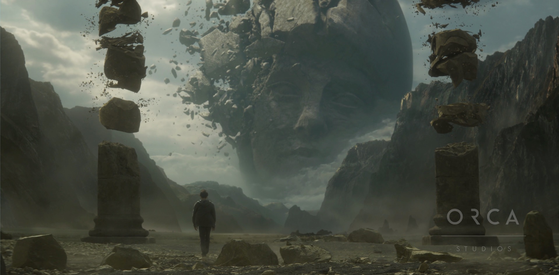 A person stands in a dramatic valley surrounded by floating, shattered stone pillars. In the background, a giant stone head, partially broken apart, floats amidst clouds and mountains. The scene demonstrates visual effects (VFX) artistry by Orca Studios.