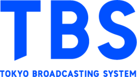 Logo of Tokyo Broadcasting System (TBS) showing the blue text 'TBS' with 'TOKYO BROADCASTING SYSTEM' written below in smaller blue letters.