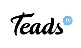 Teads logo in black script with a blue speech bubble containing '.tv' on a white background.