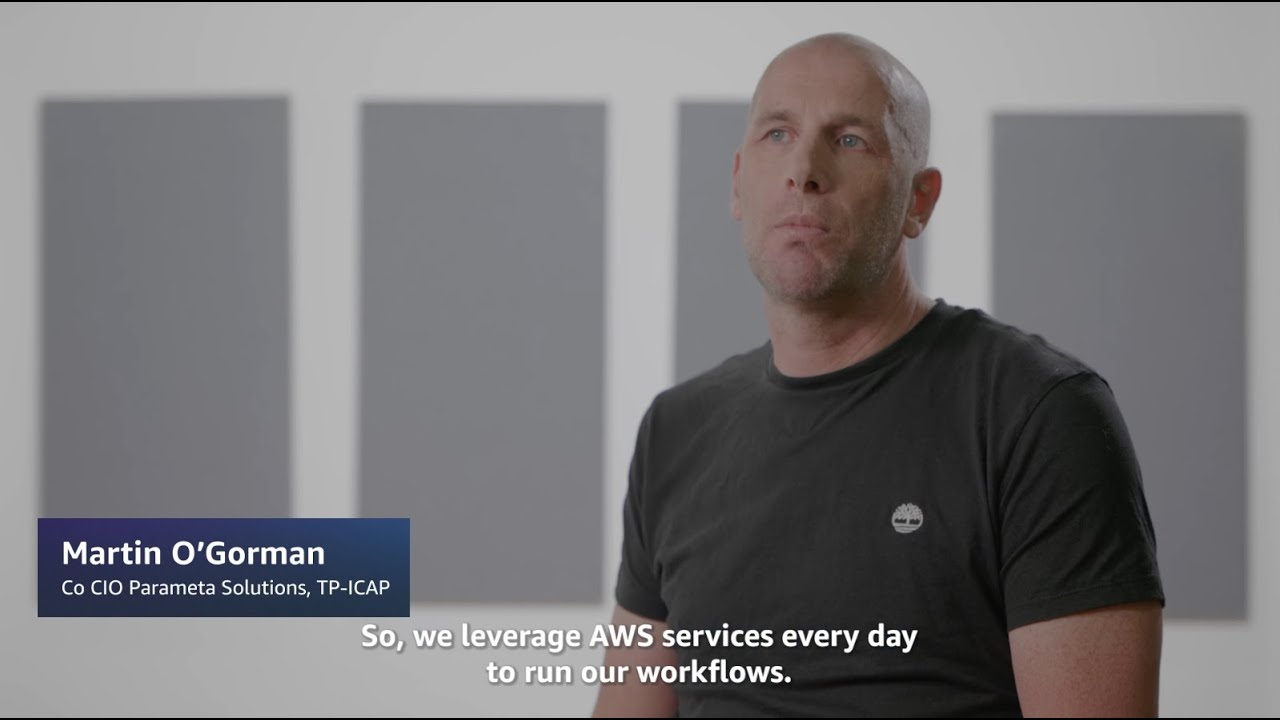 Martin O'Gorman, Co CIO of Parameta Solutions at TP-ICAP, discusses leveraging AWS services for daily workflow optimization. The image shows Martin O'Gorman in a professional interview setting with a quote about using AWS services.