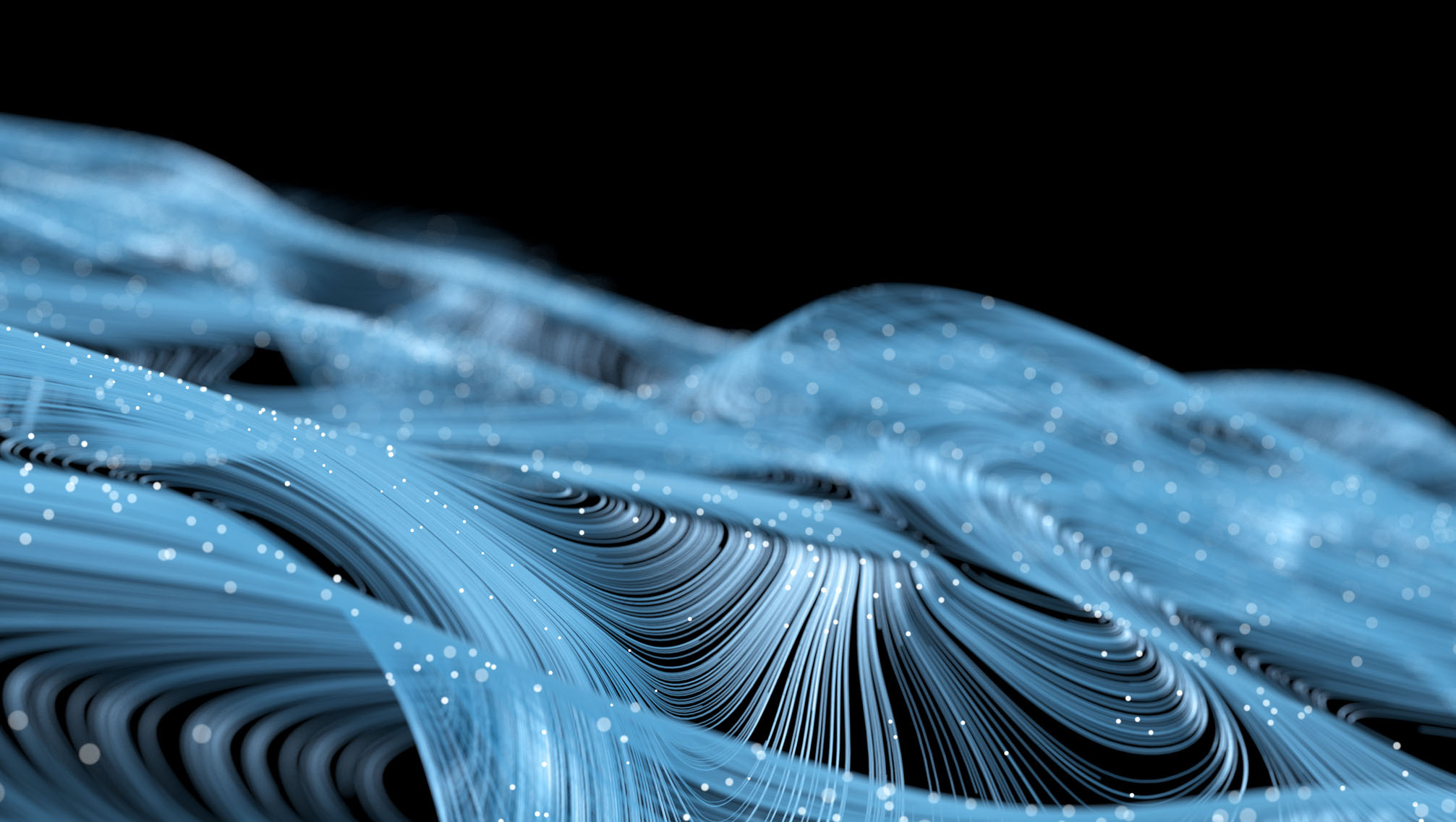 Abstract illustration of blue fiber optic waves representing telecommunications technology, with glowing dots over a black background.