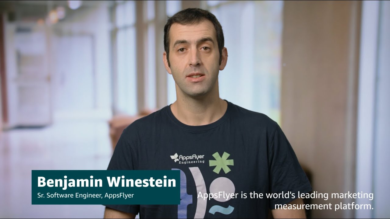 A senior software engineer from AppsFlyer discusses marketing measurement solutions, with a caption stating that AppsFlyer is the world's leading marketing measurement platform. The individual is speaking in front of a blurred background, wearing an AppsFlyer Engineering t-shirt.