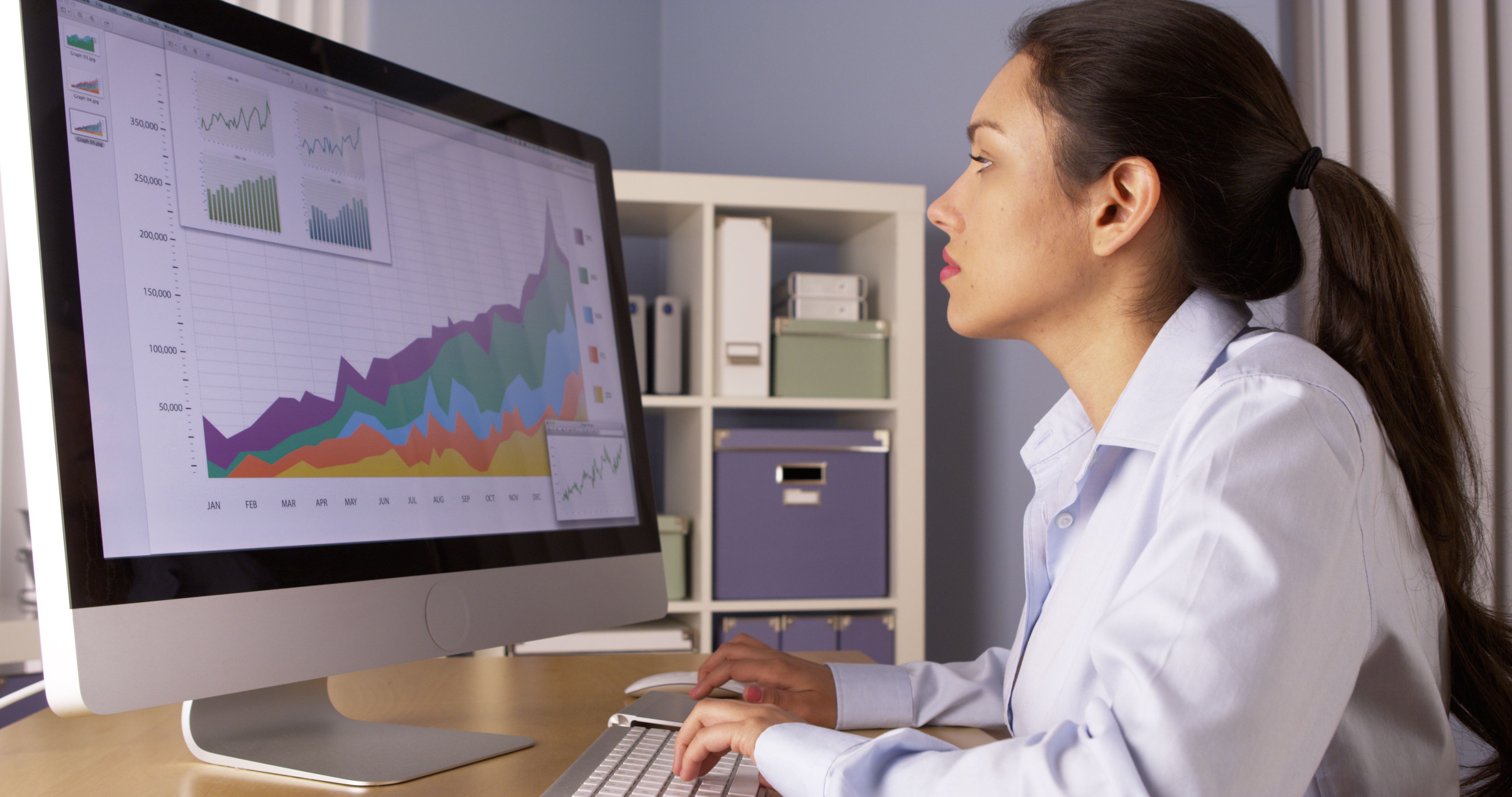 businesswoman working at desktop computer