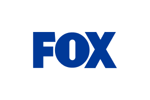 FOX logo in bold blue text on a transparent background.