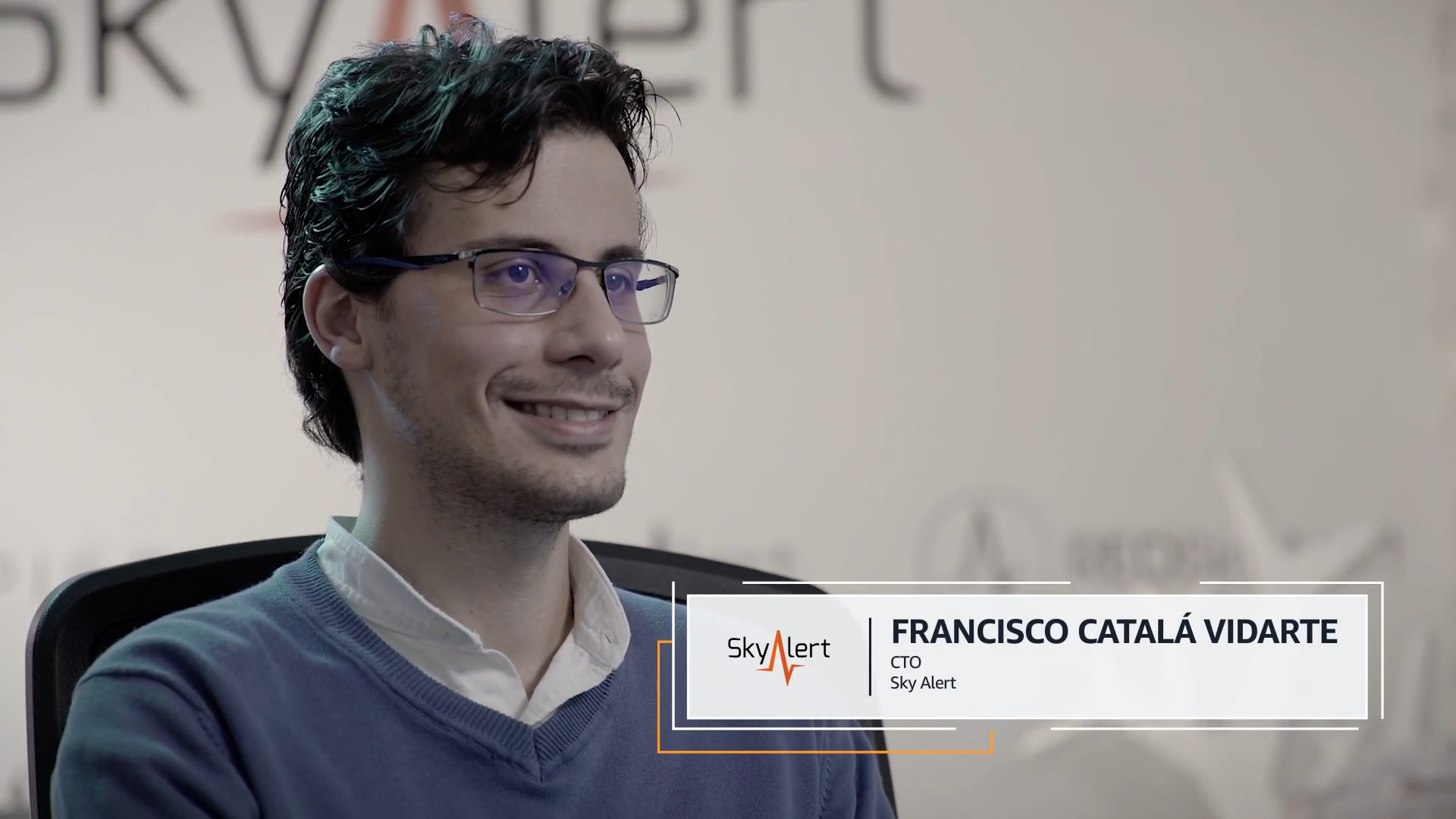 Francisco Catalá Vidarte, CTO of Sky Alert, smiling during an interview with the Sky Alert logo partially visible in the background, featured in a case study setting.