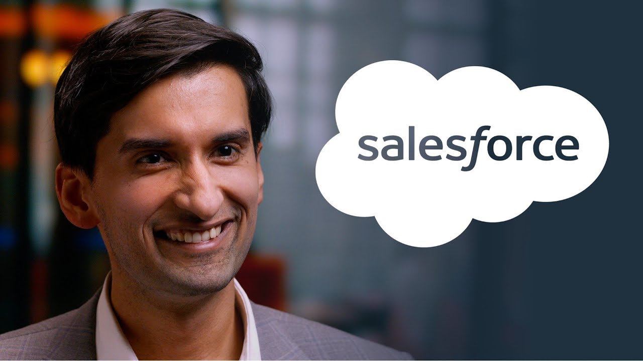 Salesforce logo inside a white cloud shape against a blurred background.