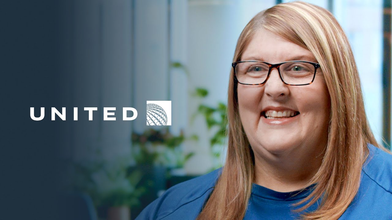 A person smiling in a professional interview setting with the United Airlines logo, used for a United Airlines case study.