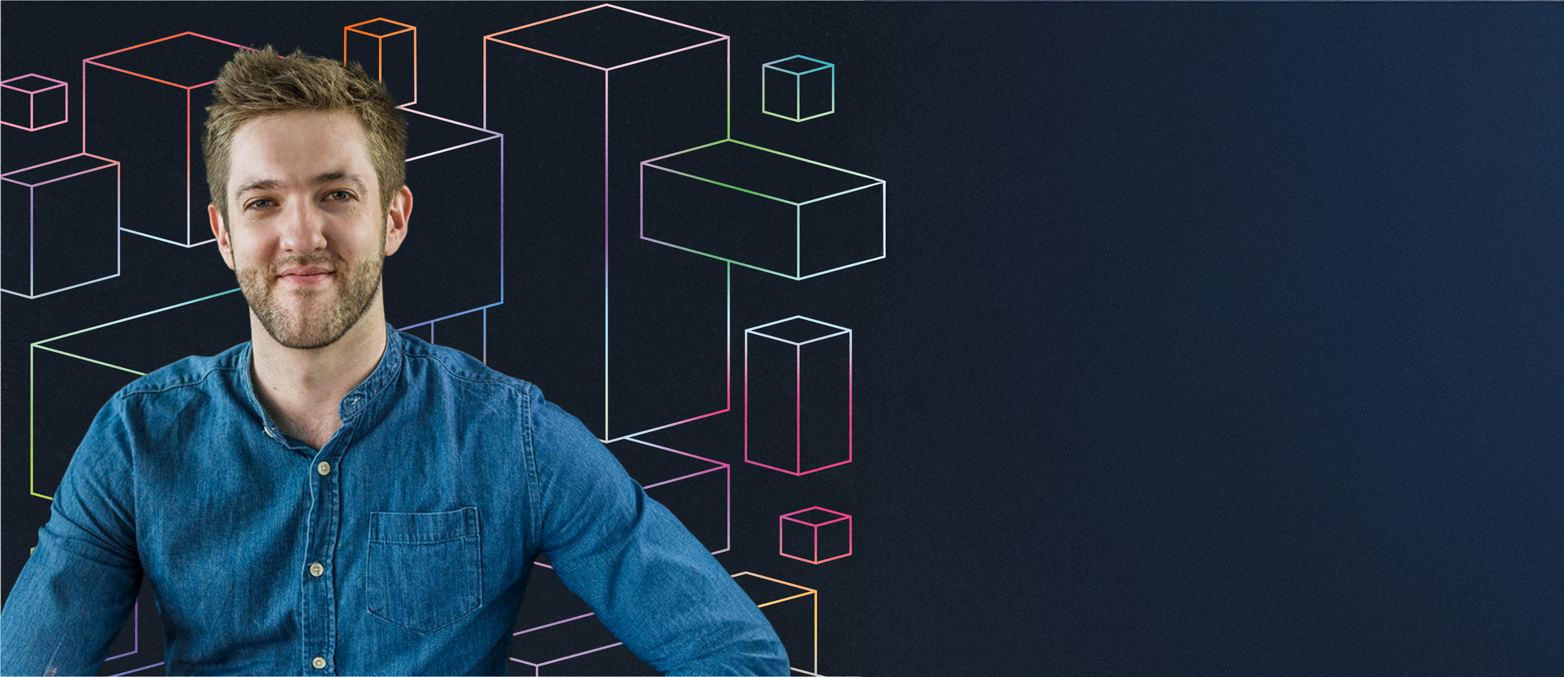 A man wearing a denim shirt is smiling in front of a dark background featuring colorful geometric cube outlines.