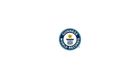 The logo of Guinness World Records featuring a circular blue border with white text, a gold star, and a pillar icon in the center, on a white background.