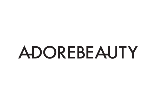 Adore Beauty logo in black text on a transparent background