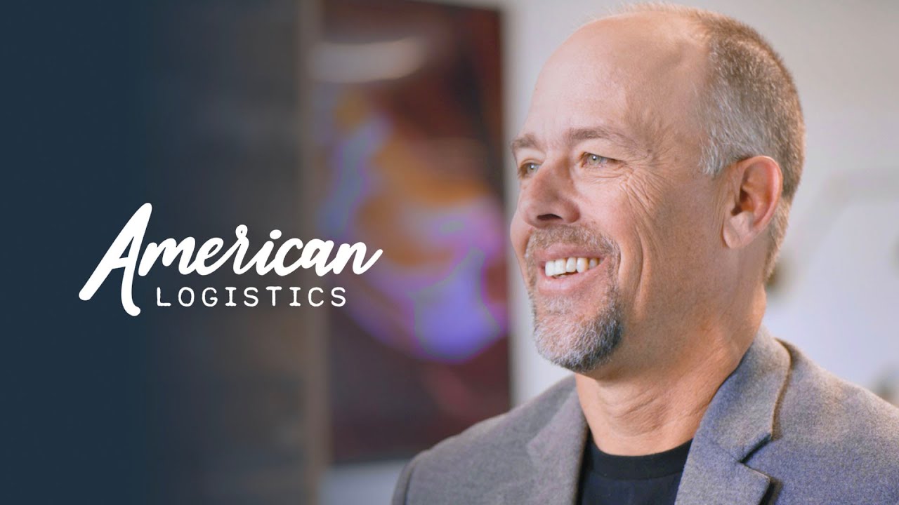 Video thumbnail featuring a smiling man in a business jacket and the American Logistics logo on the left side.