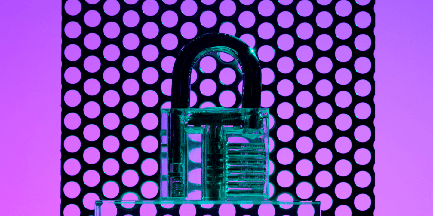 A transparent padlock displayed in front of a black circular mesh pattern, set against a neon pink and purple gradient background.