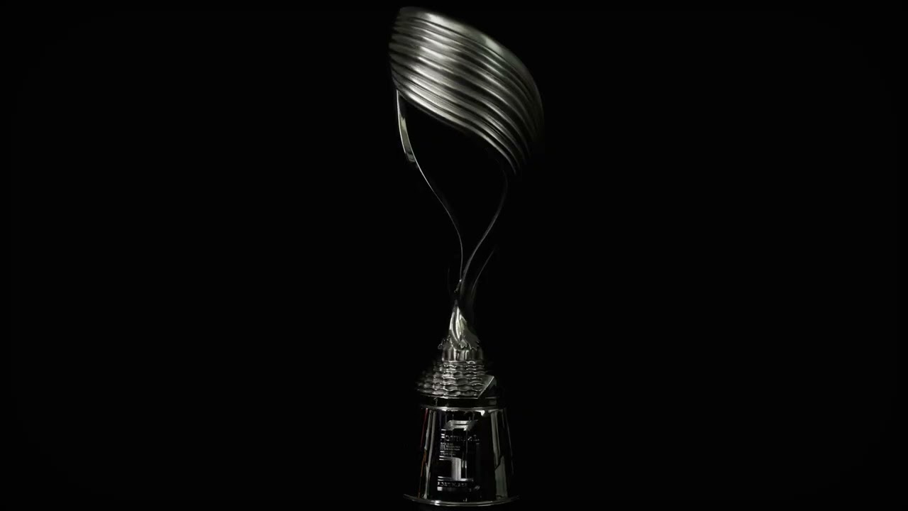 A sleek, modern silver trophy displayed against a solid black background.