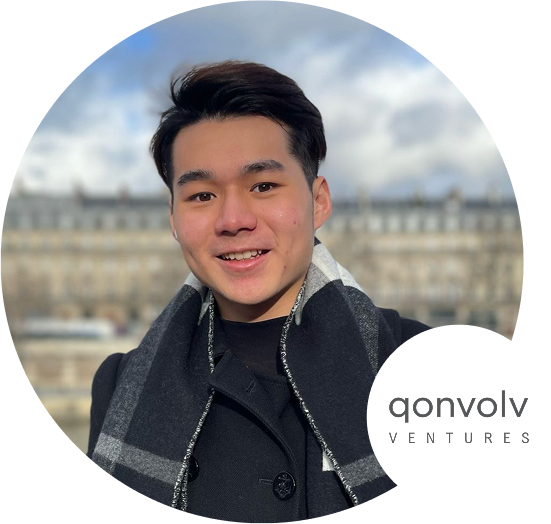 A young individual is pictured outdoors with a blurred city background, wearing a dark coat and scarf. The Qonvolv Ventures logo is visible in the lower right corner of the circular image.