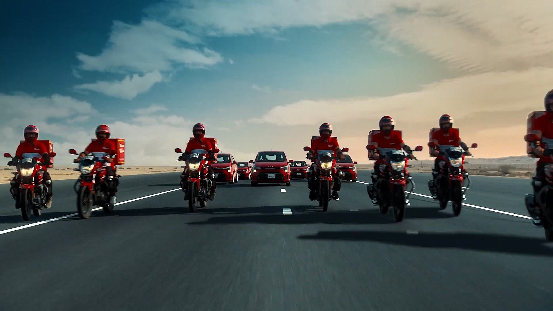 Epic shot of Snoonu delivery drivers on motorbikes