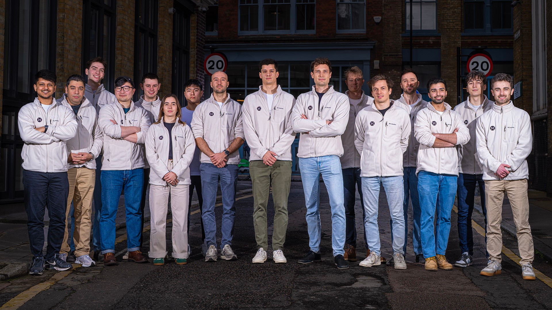 Helical team group photo taken outdoors in the evening