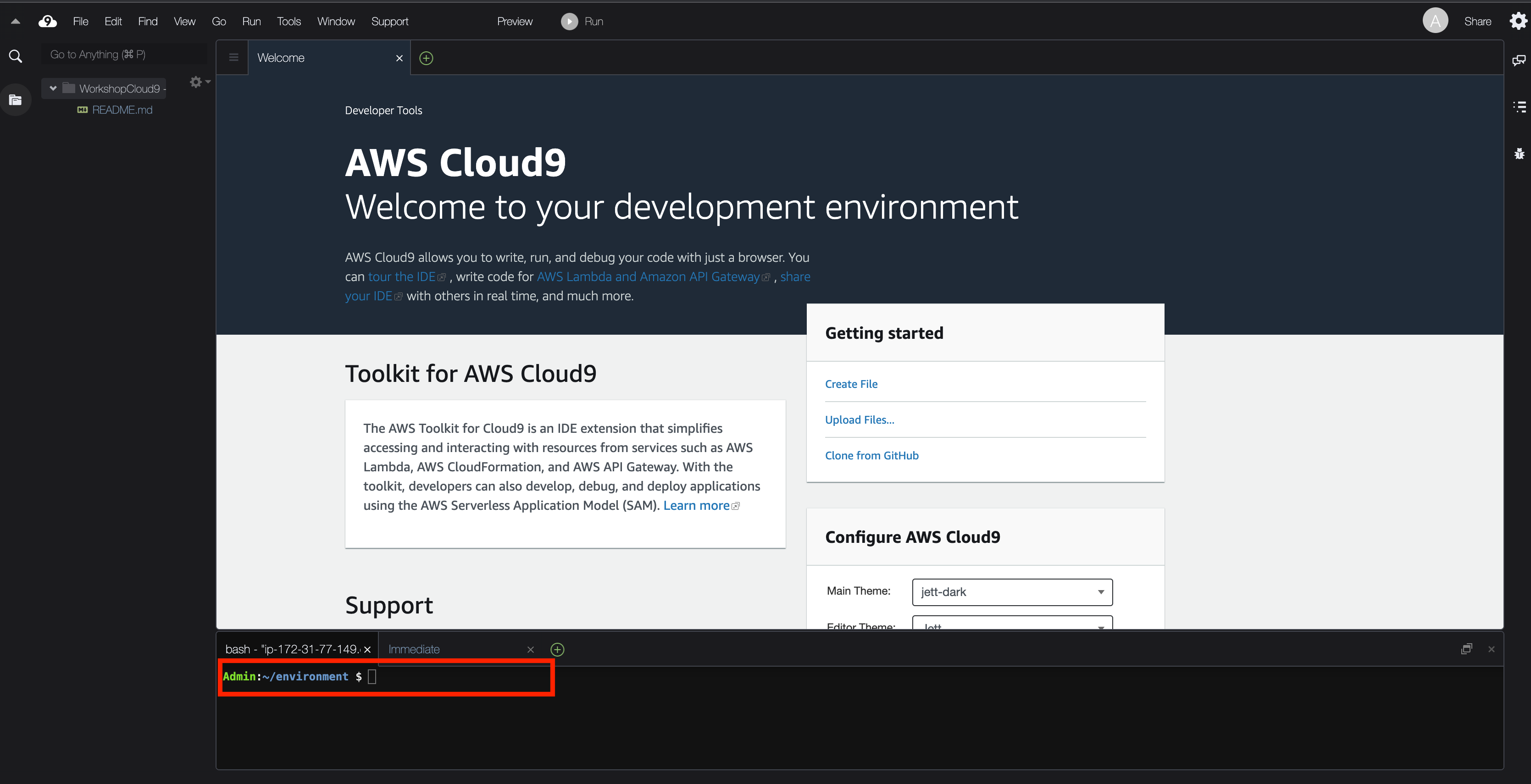Screenshot of the AWS Cloud9 development environment welcome screen, showing developer tools, toolkit introduction, getting started panel, configuration options, and a highlighted terminal prompt at the bottom.