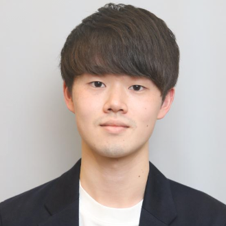 Professional headshot of a young Asian man wearing a dark blazer and white shirt, with a neutral light gray background.