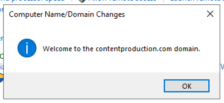 A dialog box showing a message titled 'Computer Name/Domain Changes' with text welcoming the user to the contentproduction.com domain, and an OK button.