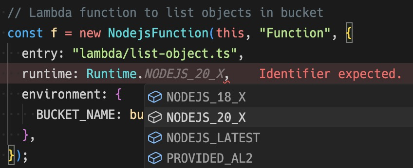 Screenshot showing a runtime error in AWS Cloud Development Kit (CDK) for a Lambda function using Node.js 20.x, with a code editor highlighting 'Identifier expected' for the runtime value.