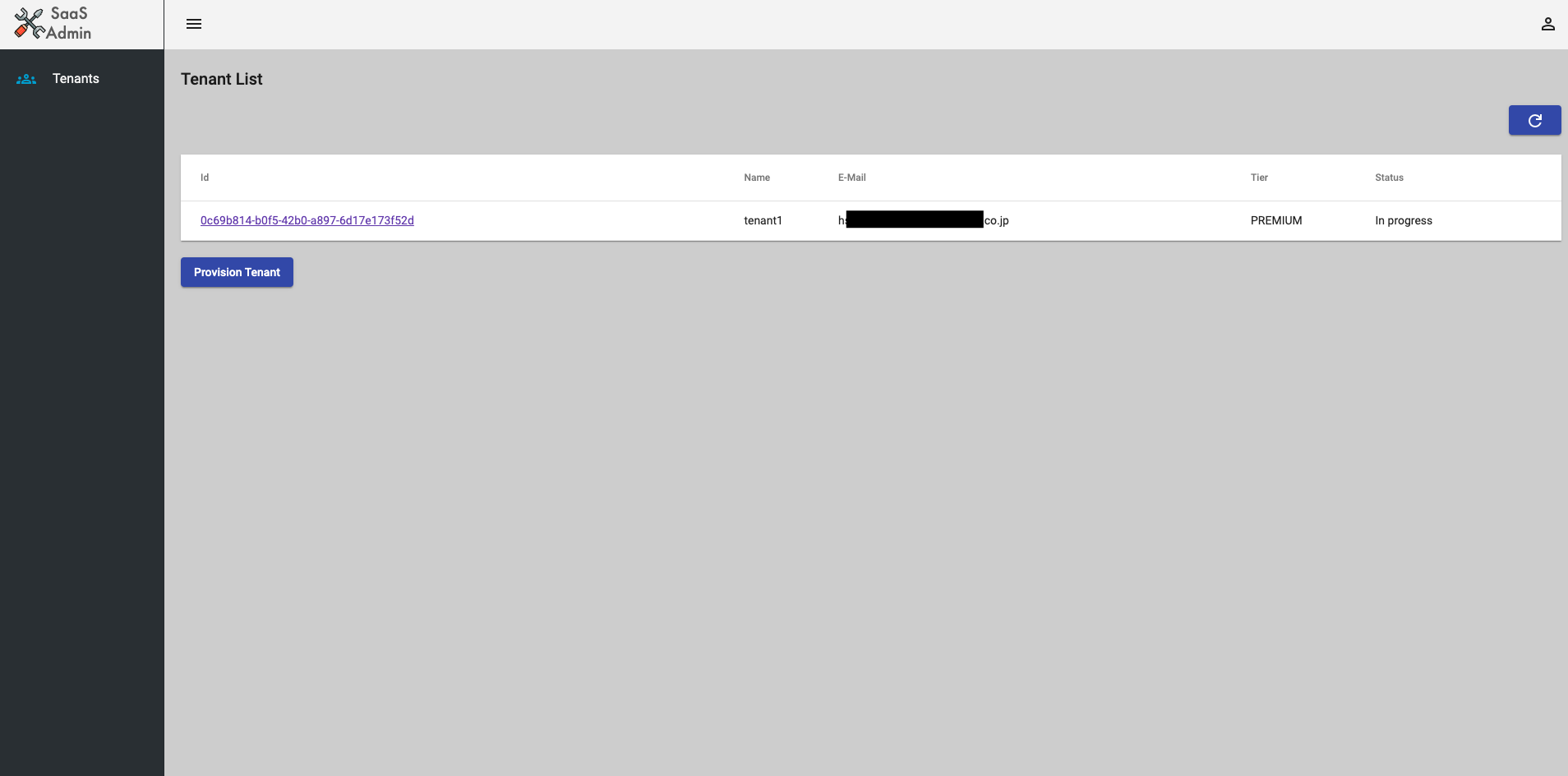 Screenshot of a SaaS Admin dashboard displaying a tenant list with details such as tenant ID, name, email, subscription tier, and status. The dashboard interface includes navigation for tenants and a button to provision a new tenant.