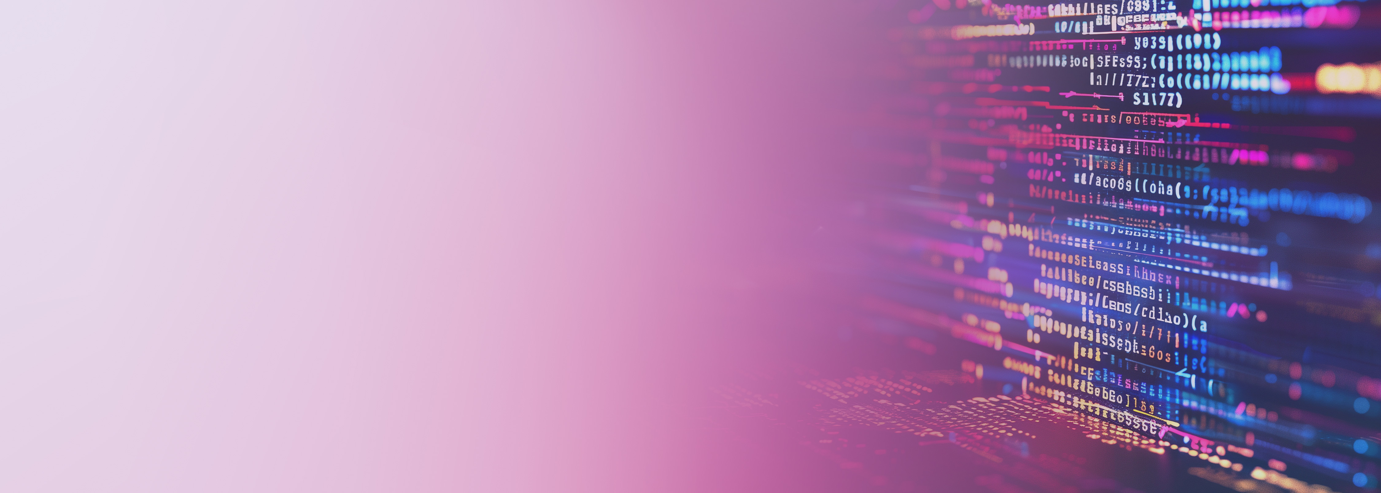 Abstract image showing colorful programming code on a dark background, representing developer CLI and application development concepts.