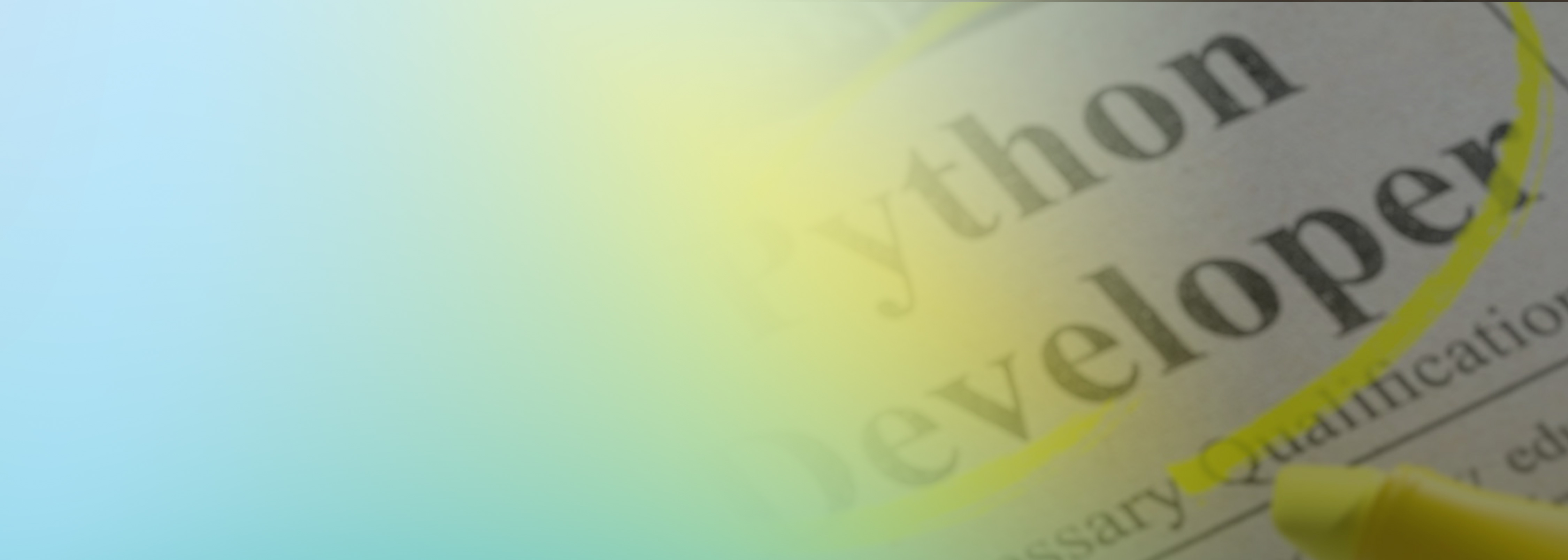 A close-up image of newspaper text highlighting 'Python Developer' with a yellow marker, used in the context of AWS Lambda Powertools for Python.