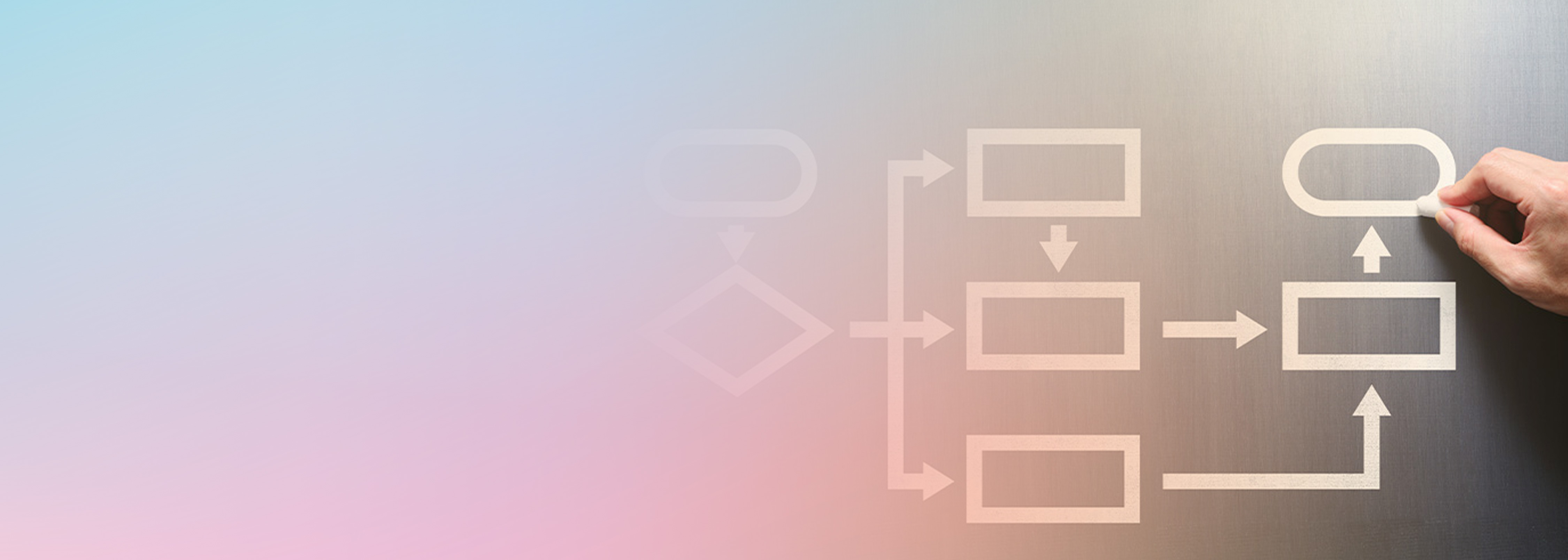 A hand drawing a flowchart diagram on a chalkboard, representing implementation of error handling in AWS Step Functions workflows.