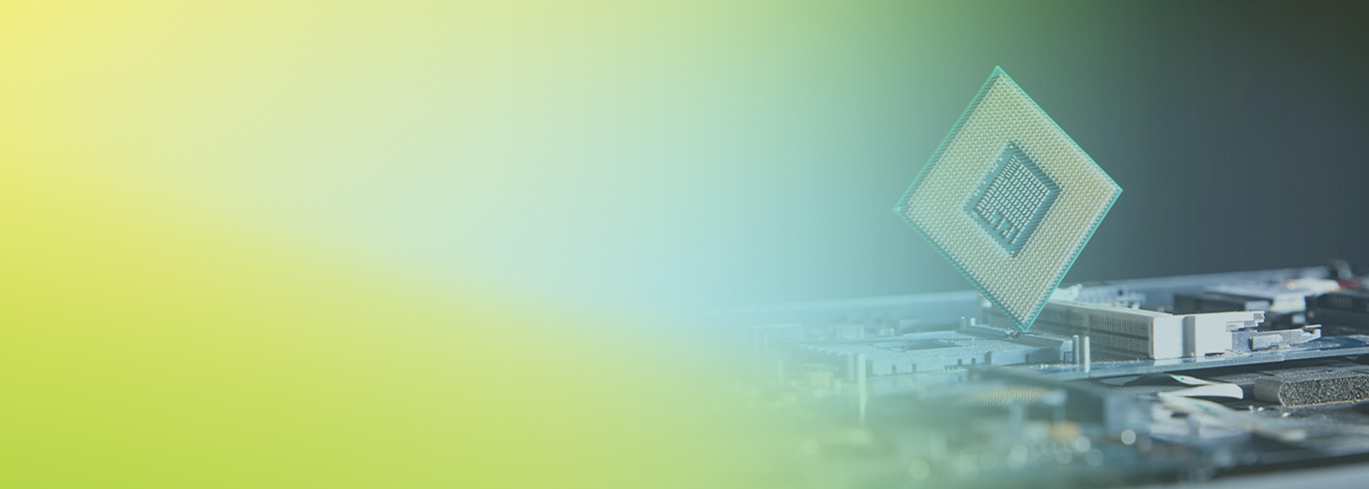 A close-up image of a computer motherboard with a processor (CPU) being installed, representing AWS Graviton technology and compute solutions.